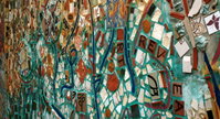 Since the 60's Philadelphia artist and '95 Pew Fellow Isaiah Zagar has been covering the buildings and sidestreets of South Street, Philadelphia, with tiles, bottles, bike tire rims, anything really. More on Zagar and his work, <a href="http://www.isaiahzagar.org/">his personal site</a> and <a href="http://www.pewarts.org/95/Zagar/">his Pew Fellow page</a>.