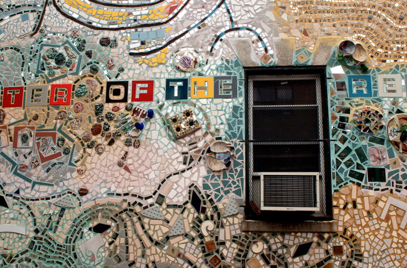 Since the 60's Philadelphia artist and '95 Pew Fellow Isaiah Zagar has been covering the buildings and sidestreets of South Street, Philadelphia, with tiles, bottles, bike tire rims, anything really. More on Zagar and his work, <a href="http://www.isaiahzagar.org/">his personal site</a> and <a href="http://www.pewarts.org/95/Zagar/">his Pew Fellow page</a>.