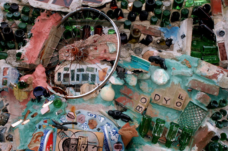 Since the 60's Philadelphia artist and '95 Pew Fellow Isaiah Zagar has been covering the buildings and sidestreets of South Street, Philadelphia, with tiles, bottles, bike tire rims, anything really. More on Zagar and his work, <a href="http://www.isaiahzagar.org/">his personal site</a> and <a href="http://www.pewarts.org/95/Zagar/">his Pew Fellow page</a>.