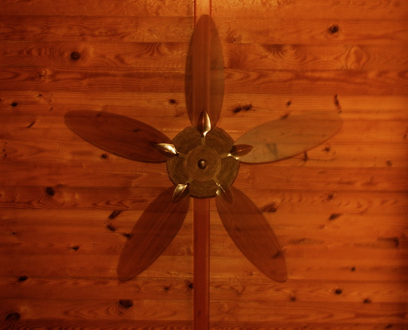 Shot the fan with a flash to freeze it and it ended up pretty straight.