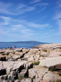 A random family I snapped on the coast of Schoodic Point in Acadia National Park. The mountain in the background is Cadillac Mountain. Schoodic Point, Acadia National Park, Maine.