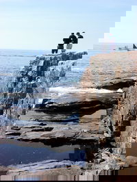 Dad and Greg watching the tide go out at Schoodic Point. Schoodic Point, Acadia National Park, Maine.