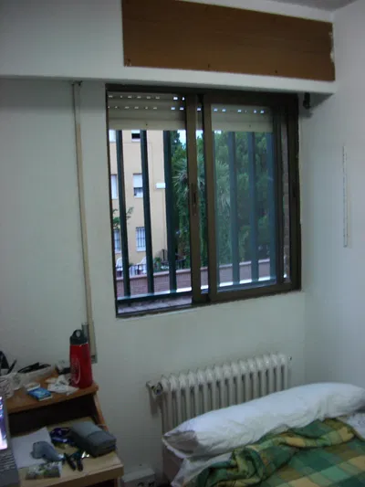 The corner of my desk and the opposite corner of my room in the Loyola Resedencia.