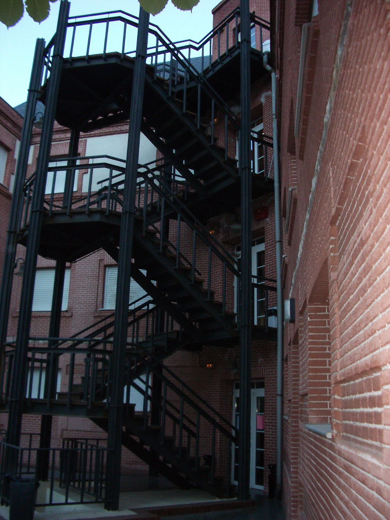 There are no stairs inside the building. Around back is the massive staircase. Number 34 building.
