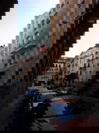 A typical sidestreet in Madrid, between Gran Via and Chueca.