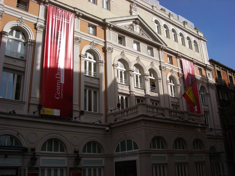 One of many theaters in Madrid, between Gran Via and Chueca. What made me take this picture, and I'm kicking myself for not zooming, was that in the third window (l to r) in the center of the building a guy all dressed up was posing in designer clothes and a couple guys were on the balcony underneath him telling him to look more sexy.