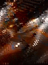 A picture of west madrid at night from above the metro stop Colombia.