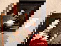 This man was doing this copy entirely by hand. The original is a Velazquez I believe, but I don't know the name. The Barber, possibly?