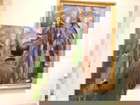 This man has been working on his version of El Greco's "St. Andrew and St. Francis" for weeks. Obviously, nobody beats the master, but he is doing a good job making a fair representation of the original.