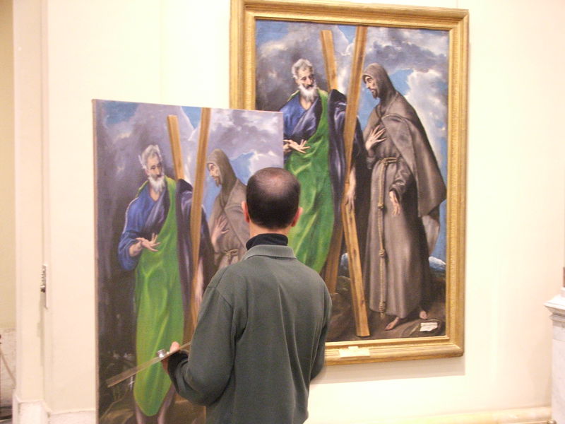 This man has been working on his version of El Greco's "St. Andrew and St. Francis" for weeks. Obviously, nobody beats the master, but he is doing a good job making a fair representation of the original.