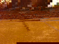 Main building. The camera was on my flashlight, and I couldn't figure a way to angle it upwards. This is the resulting picture. Too bad, the whole building was creepy.