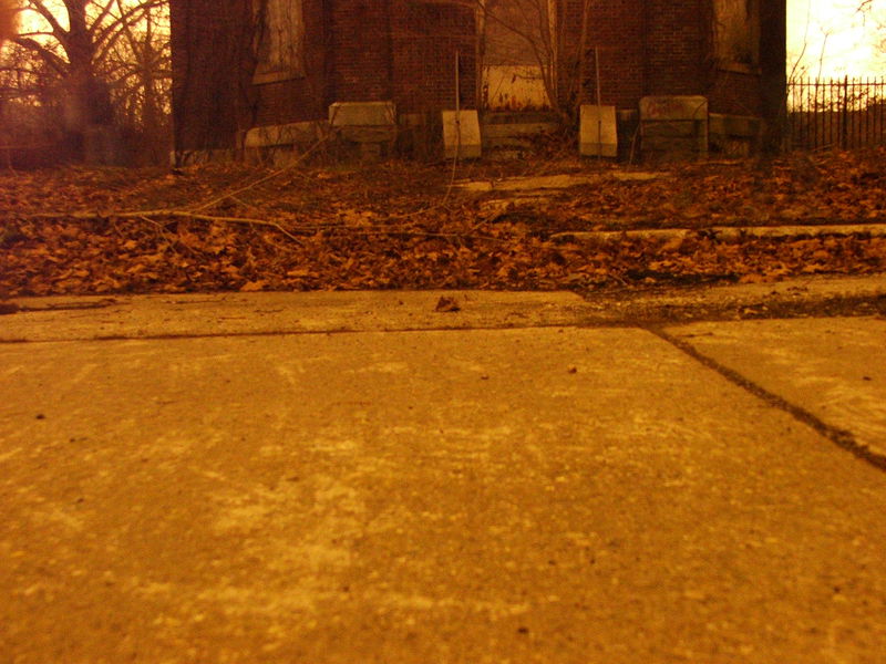 Main building. The camera was on my flashlight, and I couldn't figure a way to angle it upwards. This is the resulting picture. Too bad, the whole building was creepy.