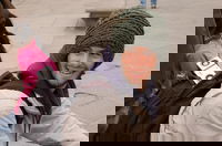 John walked around all day with those speakers hanging out of his bag playing reggae.